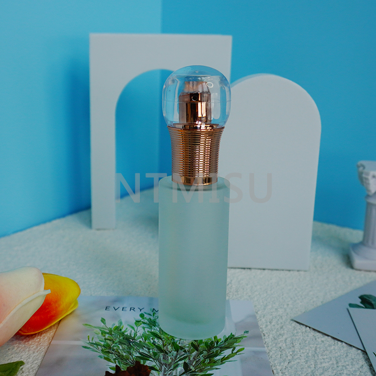 18 410 مضخة معالجة ذهبية لامعة فاخرة مع غطاء على شكل كرة البولينج وزنبرك خارجي