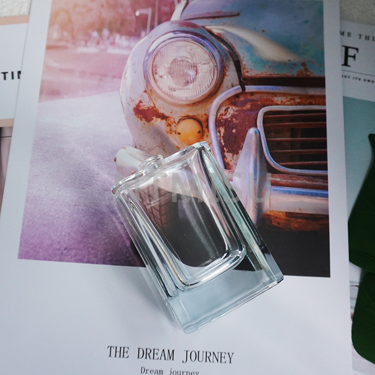 زجاجة عطر شفافة مربعة الشكل جديدة بسعة 100 مل