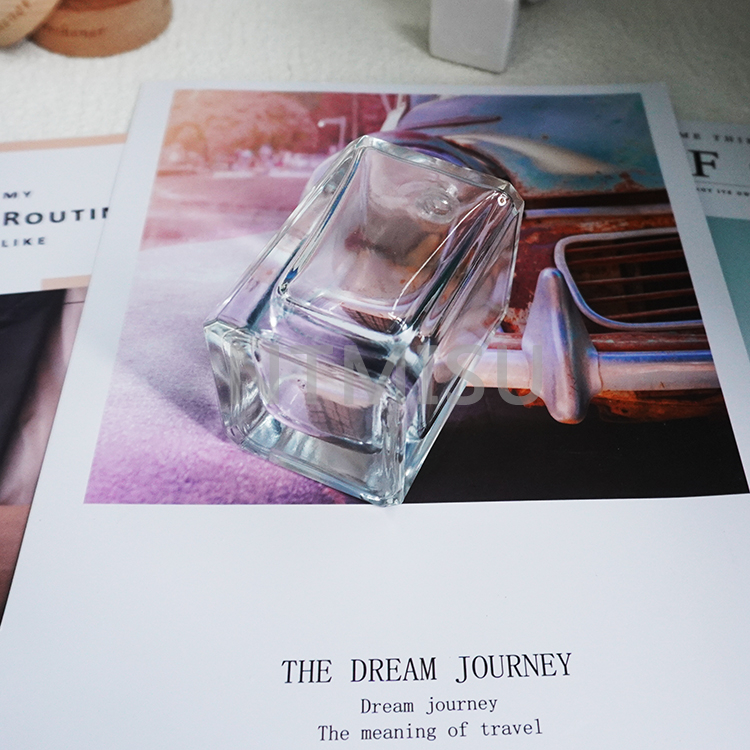 زجاجة عطر شفافة مربعة الشكل جديدة بسعة 100 مل