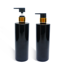 زجاجة مسطحة من PET بسعة 600 مل مع مضخة لوشن من الألومنيوم