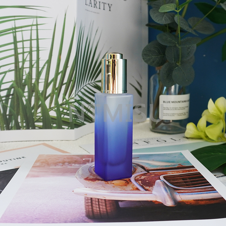 زجاجة زجاجية زرقاء متدرجة شفافة ممتازة سعة 1 أونصة 30 مل مع قطارة زيت للزيوت العطرية